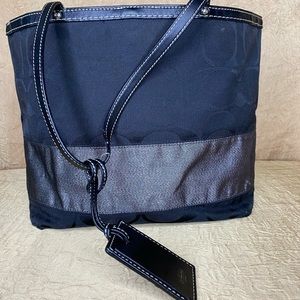 Black Jean Coach purse